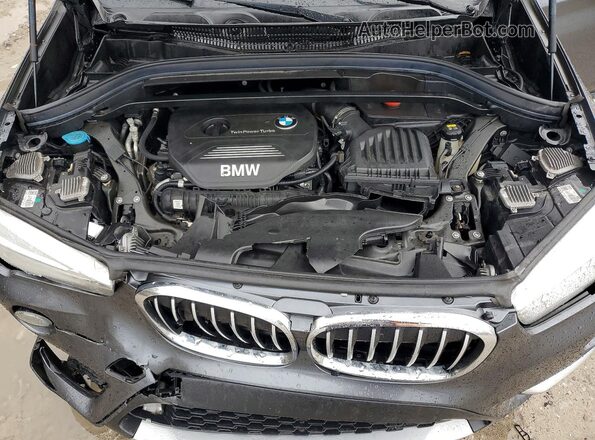 WBXHT3C34H5F85185 2017 BMW X1 Gray Engine compartment view