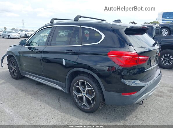 WBXHT3C34J5K22016 2018 BMW X1 Black Trasero izquierdo