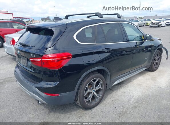 WBXHT3C34J5K22016 2018 BMW X1 Black Trasero derecho