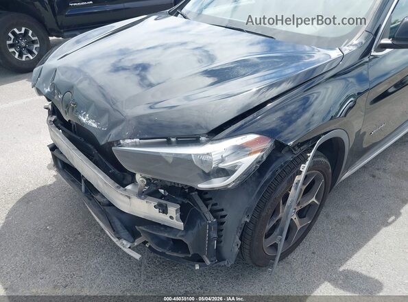 WBXHT3C34J5K22016 2018 BMW X1 Black Vista frontal