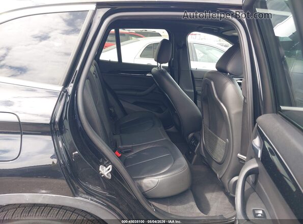 WBXHT3C34J5K22016 2018 BMW X1 Black Vista de la etiqueta del VIN