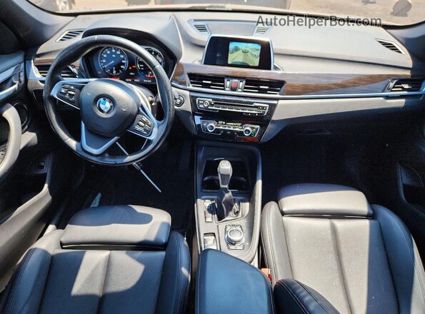 WBXHT3C34J5L27008 2018 BMW X1 Black Dashboard view