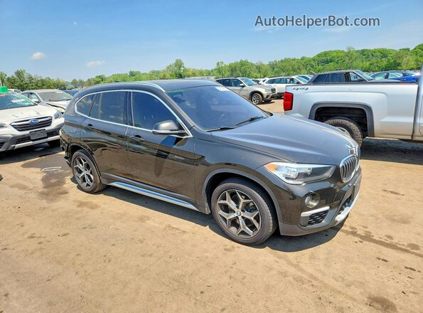 WBXHT3C34J5L27008 2018 BMW X1 Black Front right