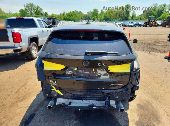 WBXHT3C34J5L27008 2018 BMW X1 Black Rear view