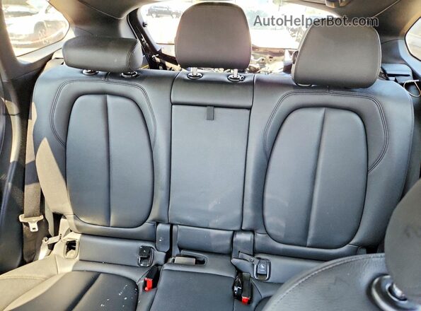 WBXHT3C34J5L27008 2018 BMW X1 Black Rear seats view