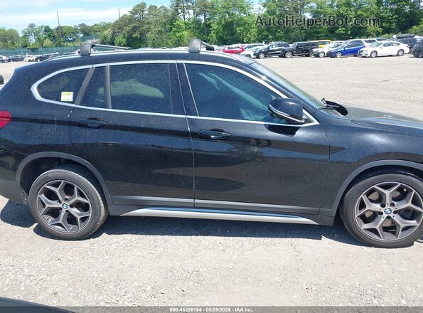 WBXHT3C34J5L28806 2018 BMW X1 Black Widok wnętrza z tyłu