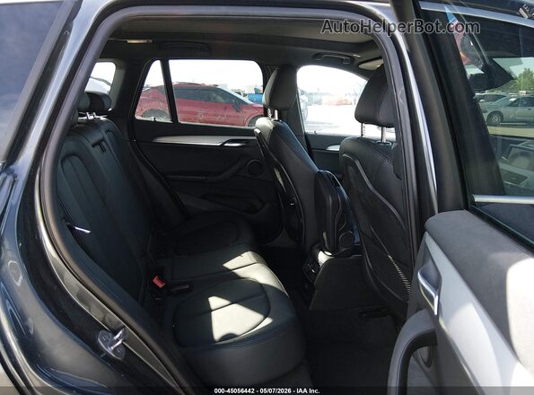 WBXHT3C35H5F73045 2017 BMW X1 Gray VIN sticker view