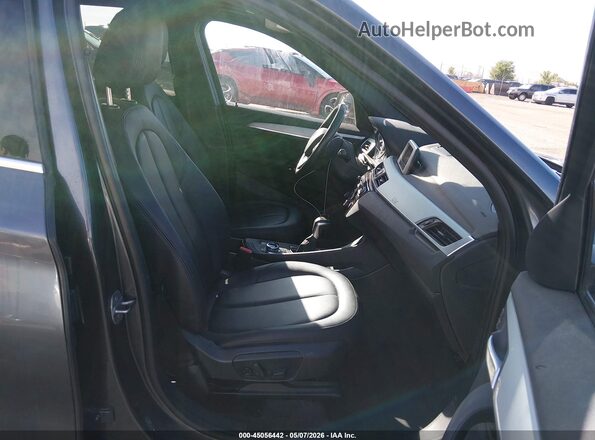 WBXHT3C35H5F73045 2017 BMW X1 Gray Front interior view