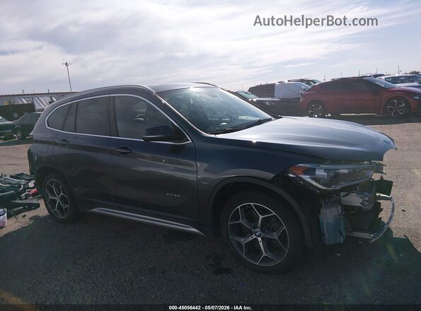 WBXHT3C35H5F73045 2017 BMW X1 Gray 360 interior view