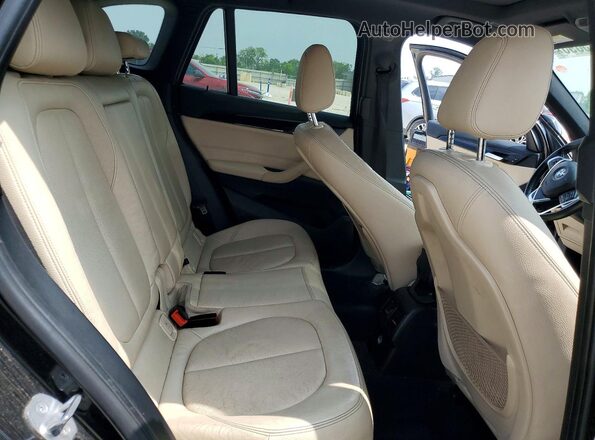 WBXHT3C35H5F75779 2017 BMW X1 Black Հետևի նստատեղերի տեսք