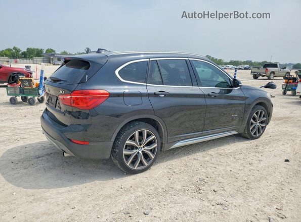 WBXHT3C35H5F75779 2017 BMW X1 Black Հետևի աջ