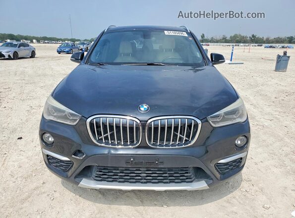 WBXHT3C35H5F75779 2017 BMW X1 Black Դիմացի տեսք