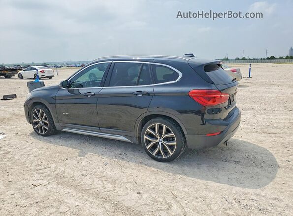 WBXHT3C35H5F75779 2017 BMW X1 Black Հետևի ձախ