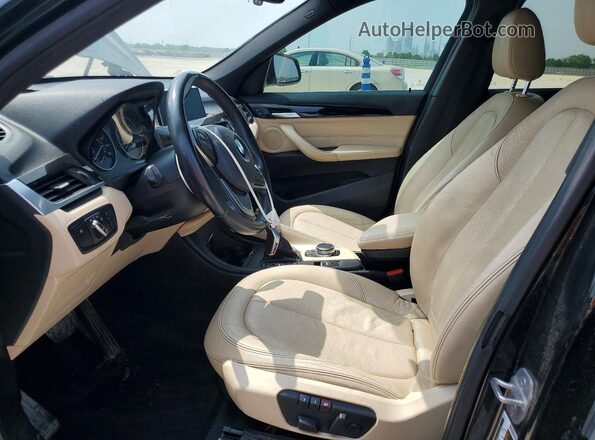 WBXHT3C35H5F75779 2017 BMW X1 Black Սալոնի դիմացի տեսք