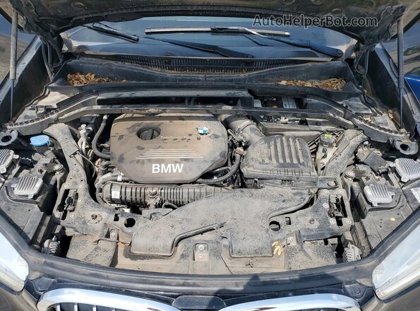 WBXHT3C35H5F75779 2017 BMW X1 Black Սալոնի հետևի տեսք
