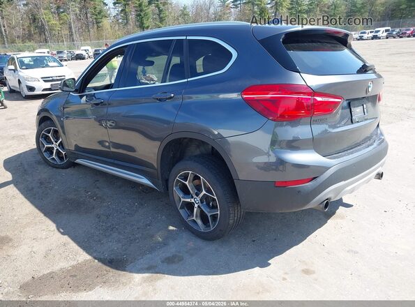 WBXHT3C35H5F81047 2017 BMW X1 Gray Rear left