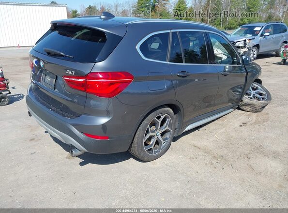 WBXHT3C35H5F81047 2017 BMW X1 Gray Rear right
