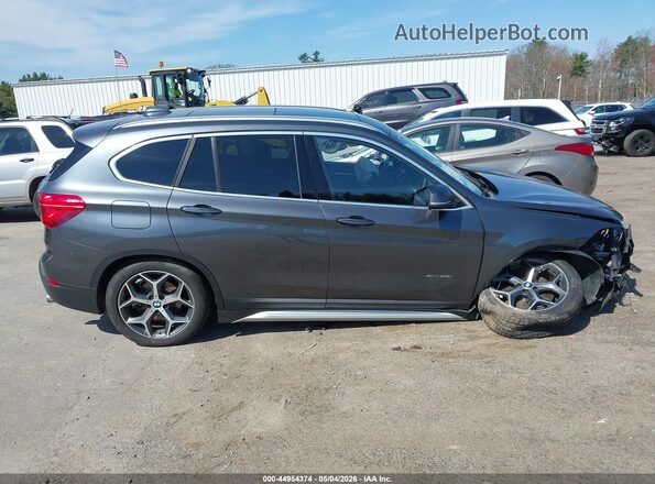 WBXHT3C35H5F81047 2017 BMW X1 Gray 360 interior view