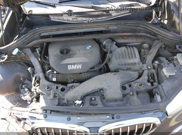 WBXHT3C35H5F81047 2017 BMW X1 Gray Rear view
