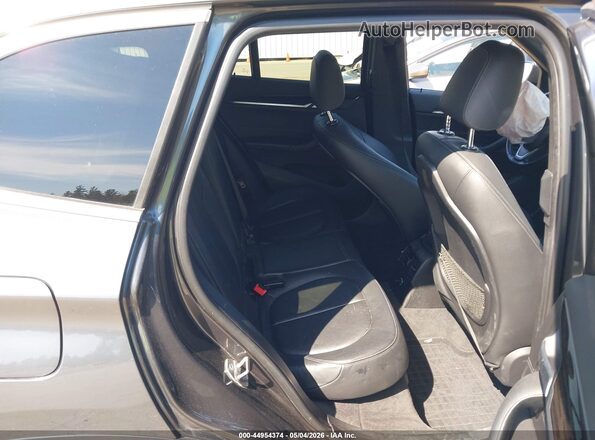 WBXHT3C35H5F81047 2017 BMW X1 Gray VIN sticker view