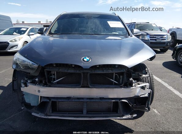 WBXHT3C35J3H33670 2018 BMW X1 Gray Widok wnętrza z tyłu