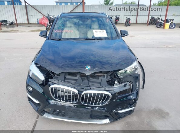 WBXHT3C35J5F89798 2018 BMW X1 Black Instrument cluster view