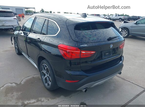 WBXHT3C35J5F89798 2018 BMW X1 Black Rear left