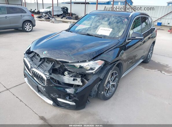 WBXHT3C35J5F89798 2018 BMW X1 Black Front left