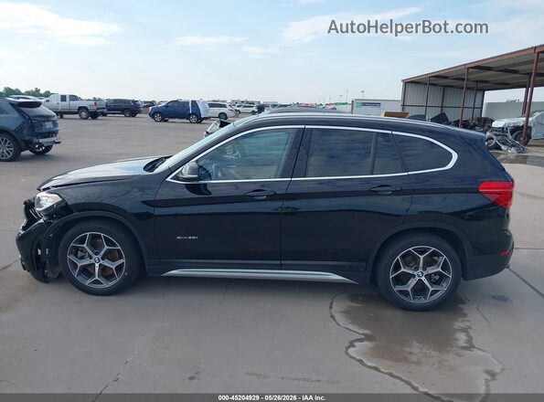 WBXHT3C35J5F89798 2018 BMW X1 Black 360 interior view