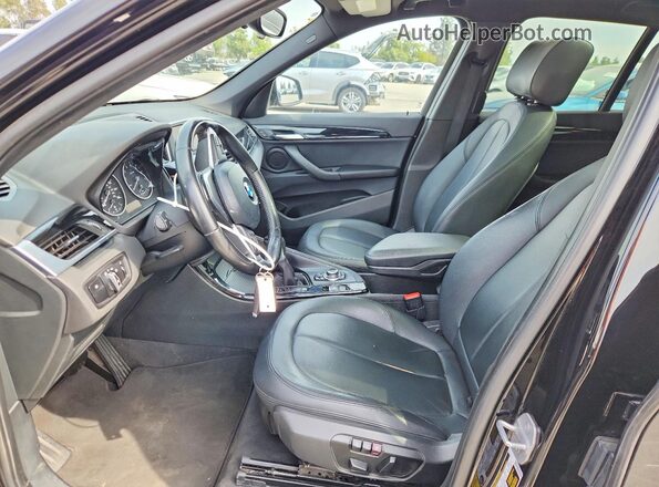 WBXHT3C36GP880188 2016 BMW X1 Black Widok wnętrza z przodu