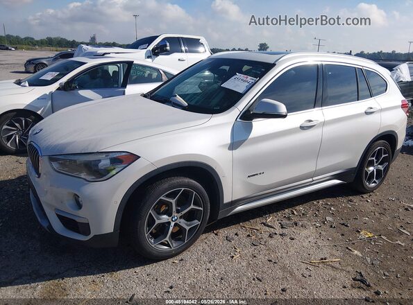 WBXHT3C36H5F71367 2017 BMW X1 White წინა მარცხენა ხედი სამი მეოთხედიდან