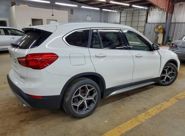 WBXHT3C36J5L30928 2018 BMW X1 White Rear right