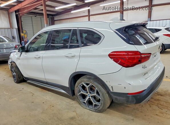 WBXHT3C36J5L30928 2018 BMW X1 White Rear left