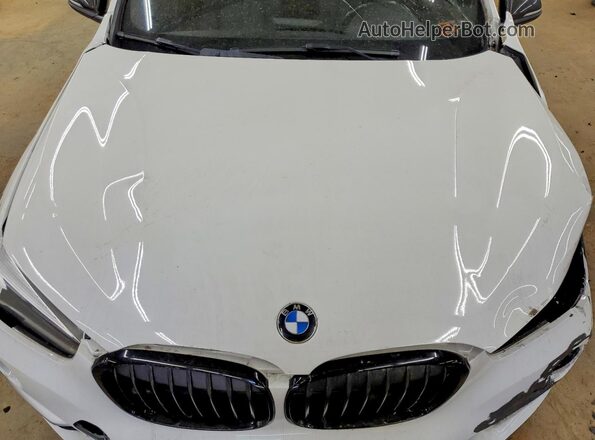 WBXHT3C36J5L30928 2018 BMW X1 White Engine compartment view