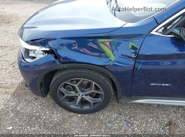 WBXHT3C37H5F71930 2017 BMW X1 Blue Front view