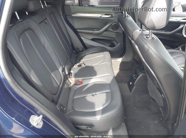 WBXHT3C37H5F71930 2017 BMW X1 Blue VIN sticker view