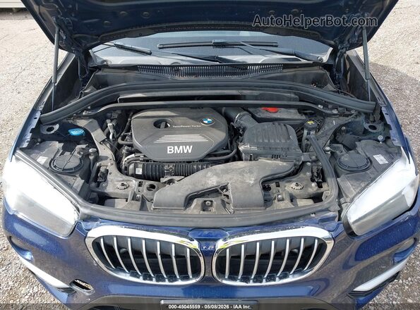 WBXHT3C37H5F71930 2017 BMW X1 Blue Rear view