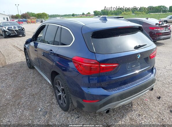 WBXHT3C37H5F71930 2017 BMW X1 Blue Rear left