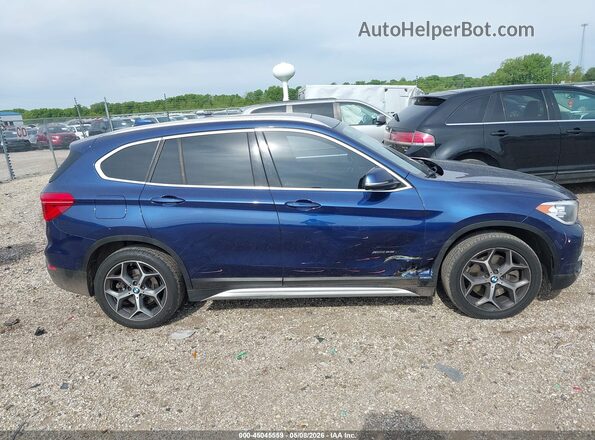 WBXHT3C37H5F71930 2017 BMW X1 Blue Rear interior view