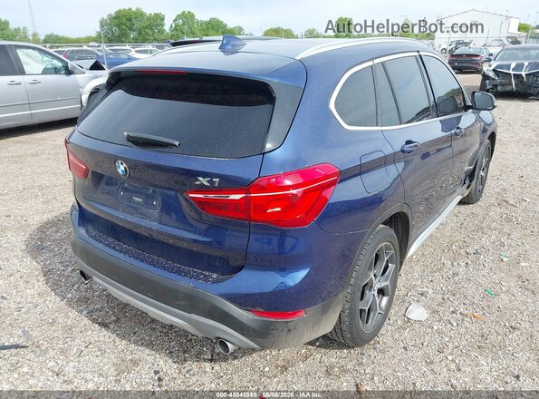 WBXHT3C37H5F71930 2017 BMW X1 Blue Rear right