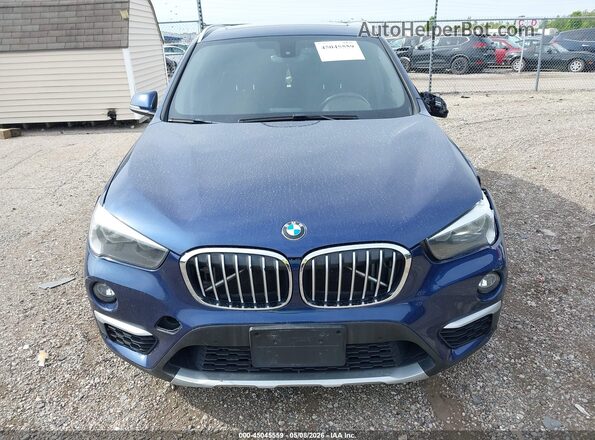 WBXHT3C37H5F71930 2017 BMW X1 Blue Instrument cluster view