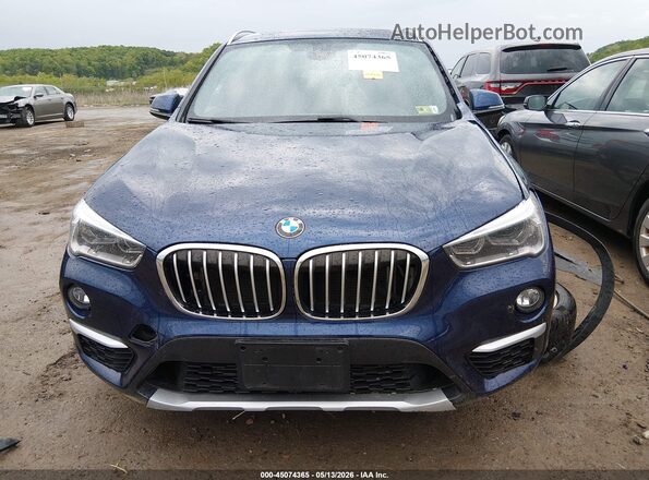 WBXHT3C37J5K27520 2018 BMW X1 Blue Vista del cuadro de instrumentos