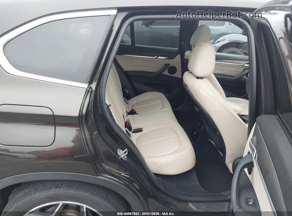 WBXHT3C38G5E55439 2016 BMW X1 Black 