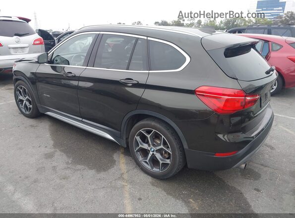WBXHT3C38G5E55439 2016 BMW X1 Black 