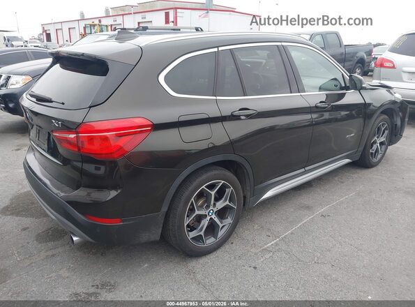 WBXHT3C38G5E55439 2016 BMW X1 Black 