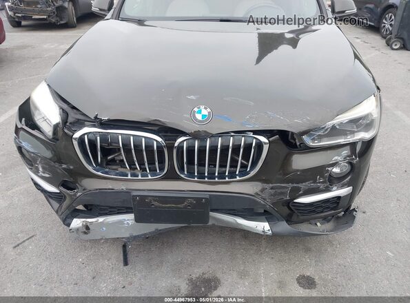 WBXHT3C38G5E55439 2016 BMW X1 Black 