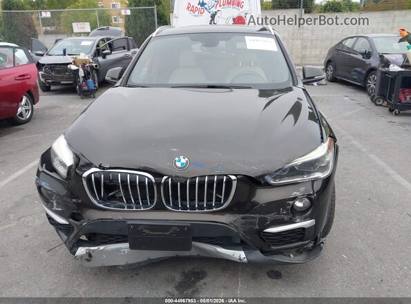 WBXHT3C38G5E55439 2016 BMW X1 Black 
