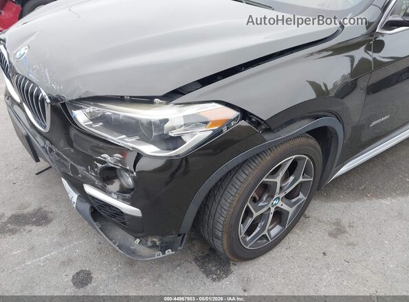 WBXHT3C38G5E55439 2016 BMW X1 Black 