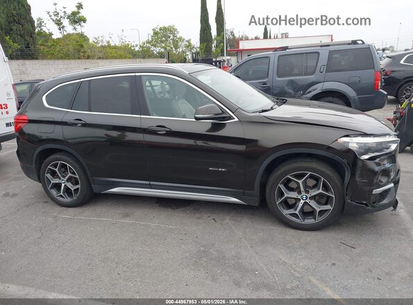 WBXHT3C38G5E55439 2016 BMW X1 Black 