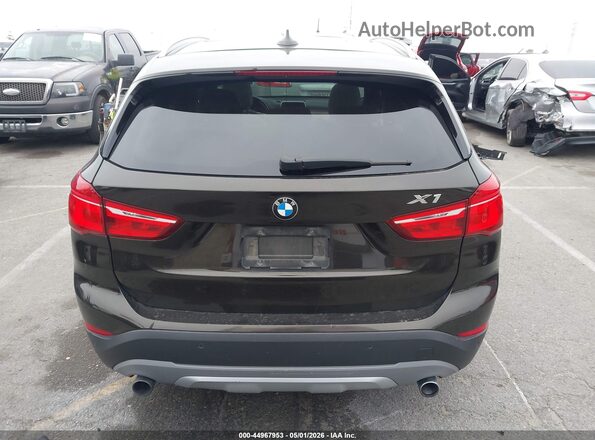 WBXHT3C38G5E55439 2016 BMW X1 Black 